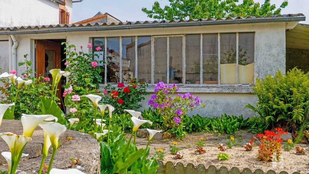 Maison de Bourg  de 89 m² + 26 m² de véranda – 3 chambres